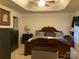 Serene main bedroom with tray ceiling, creating a relaxing retreat at 4016 Holly Villa Cir, Indian Trail, NC 28079