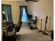Home office featuring a desk, office chair, and neutral walls and carpet at 4016 Holly Villa Cir, Indian Trail, NC 28079