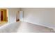 Large bedroom with neutral carpet, a doorway, and an entrance to a walk-in closet at 515 Tates Trl # 39, Cramerton, NC 28032