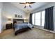 Bright bedroom with ample natural light and a ceiling fan, creating a serene atmosphere at 1041 Kensrowe Ln, Matthews, NC 28104