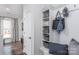 Stylish entryway features storage cubbies, a bench, and decorative accents, creating a welcoming space at 1290 Kindness Nw Ct, Concord, NC 28027