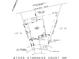 Property map showcasing lot dimensions, home layout, patio, garage, and street access at 1290 Kindness Nw Ct, Concord, NC 28027