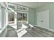 Light-filled bedroom with soothing green walls, hardwood floors, and ample closet space at 569 Evergreen Rd, Clover, SC 29710