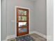 Modern entryway with a wooden door and a rug at 569 Evergreen Rd, Clover, SC 29710