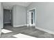 Bright hallway with hardwood floors and access to other rooms at 569 Evergreen Rd, Clover, SC 29710