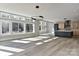 Bright and airy living room with large windows and hardwood floors at 569 Evergreen Rd, Clover, SC 29710