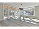 Bright living room featuring hardwood floors and large windows at 569 Evergreen Rd, Clover, SC 29710