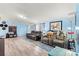 Cozy living room with comfortable seating and lots of natural light at 7686 Hickory Creek Dr, Denver, NC 28037