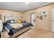 Comfortable main bedroom with a cozy bed and ensuite bathroom at 7686 Hickory Creek Dr, Denver, NC 28037