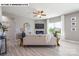 Cozy living room features a ceiling fan, electric fireplace, and neutral tones, creating a relaxing atmosphere at 107 Rustling Waters Dr, Mooresville, NC 28117