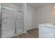 Bright bathroom boasts a shower with glass enclosure and built-in shelving at 1209 Red River Dr, Salisbury, NC 28144