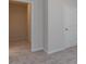 Bedroom with access to another room and grey carpet at 1209 Red River Dr, Salisbury, NC 28144