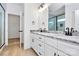 Modern bathroom with double sink vanity with granite countertops and a view into the glass-enclosed shower at 2059 Parks Rd, Salisbury, NC 28147