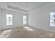 Bright bedroom with three windows offers an airy feel and plenty of natural light at 2059 Parks Rd, Salisbury, NC 28147