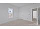 Bedroom with a window that offers natural light and a glimpse of the outdoors at 2059 Parks Rd, Salisbury, NC 28147
