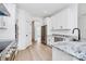 Modern kitchen featuring stainless appliances, granite counters, and white cabinets at 2059 Parks Rd, Salisbury, NC 28147