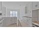 Spacious kitchen featuring white cabinets, a large window, and natural light at 2059 Parks Rd, Salisbury, NC 28147