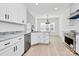 Modern kitchen with granite countertops, stainless steel appliances, and light wood flooring at 2059 Parks Rd, Salisbury, NC 28147