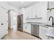 Kitchen featuring stainless appliances, granite counters, and white cabinets at 2059 Parks Rd, Salisbury, NC 28147