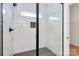Contemporary shower stall featuring white marble style tiling and sleek black fixtures at 2059 Parks Rd, Salisbury, NC 28147