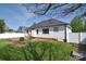 Charming home featuring a well-maintained backyard with a deck and white privacy fence at 217 Dewars Dr, Rock Hill, SC 29730