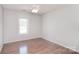 Cozy bedroom featuring natural light from a window and modern flooring at 217 Dewars Dr, Rock Hill, SC 29730