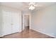 Bedroom featuring closet, neutral walls, door to hallway, and modern flooring at 217 Dewars Dr, Rock Hill, SC 29730
