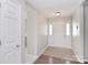 Bright foyer with tile flooring and a view into adjacent rooms at 217 Dewars Dr, Rock Hill, SC 29730