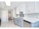 Bright kitchen featuring white cabinets, countertops, and stainless steel appliances at 217 Dewars Dr, Rock Hill, SC 29730