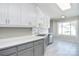White kitchen featuring white cabinets and countertops with a stainless steel dishwasher at 217 Dewars Dr, Rock Hill, SC 29730