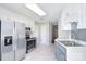 Bright kitchen with stainless steel appliances and white and grey cabinets at 217 Dewars Dr, Rock Hill, SC 29730