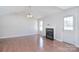 Bright and airy living room with hardwood flooring and a cozy fireplace at 217 Dewars Dr, Rock Hill, SC 29730