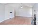 Hardwood floors in an open-concept living room, with fireplace and mounted television at 217 Dewars Dr, Rock Hill, SC 29730