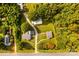 Expansive aerial view of property featuring multiple structures amidst lush greenery and a long driveway at 5960/5930 S Main St, Salisbury, NC 28147