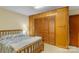 Bedroom with a wooden bed frame and a large wooden closet at 5960/5930 S Main St, Salisbury, NC 28147
