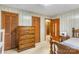 Bedroom with a wooden dresser and view into another room at 5960/5930 S Main St, Salisbury, NC 28147