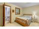 Comfortable bedroom featuring a wooden-frame bed and an adjoining bathroom at 5960/5930 S Main St, Salisbury, NC 28147