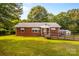 Charming brick home with a wheelchair ramp leading to the front entrance and a well-maintained lawn at 5960/5930 S Main St, Salisbury, NC 28147
