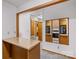 View from breakfast bar into a functional kitchen with wood accents at 5960/5930 S Main St, Salisbury, NC 28147