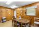 Cozy kitchen area with a wood table set and wooden paneled walls at 5960/5930 S Main St, Salisbury, NC 28147