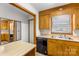 This Kitchen has wooden cabinets, a stainless steel sink, and a great view at 5960/5930 S Main St, Salisbury, NC 28147