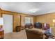 Comfortable living room featuring wood paneling, classic furniture, and a traditional ambiance at 5960/5930 S Main St, Salisbury, NC 28147