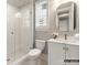 Stylish bathroom with a white vanity, toilet and walk-in shower at 8115 Farm Crossing Ln # 3, Huntersville, NC 28078