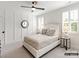 Bright bedroom with a comfortable queen-size bed and plenty of natural light at 8115 Farm Crossing Ln # 3, Huntersville, NC 28078