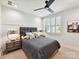 Cozy bedroom with soft lighting, neutral colors, and a comfortable upholstered bed frame and headboard at 8115 Farm Crossing Ln # 3, Huntersville, NC 28078
