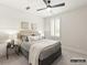 Charming bedroom with window seat and neutral color palette at 8115 Farm Crossing Ln # 3, Huntersville, NC 28078