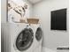 Laundry room with washer and dryer, plus additional storage space at 8115 Farm Crossing Ln # 3, Huntersville, NC 28078