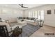 Spacious living room featuring a comfy sectional sofa and a stylish area rug at 8115 Farm Crossing Ln # 3, Huntersville, NC 28078