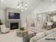 Spacious living room with vaulted ceilings and a fireplace at 8115 Farm Crossing Ln # 3, Huntersville, NC 28078