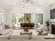 Living room with sliding doors opening to a covered patio at 8115 Farm Crossing Ln # 3, Huntersville, NC 28078